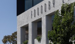 一个20世纪60年代的橙色砖仓库如何变成了一个类似织物的钢铁住宅